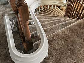 elederly curved stairchair